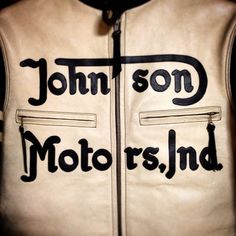 a white leather jacket with the words john son moto's land written on it