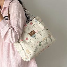 Brand Name: IMYOKHandbags Type: Shoulder BagsTypes of bags: Shoulder & HandbagsMain Material: PolyesterLining Material: PolyesterShape: Casual TotePlace Of Origin: GUANG DONG ProvincePlace Of Origin: GUANG DONG ProvinceOrigin: Mainland ChinaCN: GuangdongHardness: SoftPattern Type: FloralInterior: No PocketOccasion: VersatileClosure Type: HaspGender: WOMENStyle: FashionModel Number: u42703Number of Handles/Straps: Two Casual Rectangular Canvas Bag With Floral Print, Trendy Rectangular Canvas Bag For Spring, Trendy Floral Print Tote Shoulder Bag, Spring Large Capacity Rectangular Canvas Bag, Flower-shaped Shoulder Bag For Everyday Use, Trendy Flower-shaped Shoulder Bag For Shopping, Spring Flower-shaped Large Capacity Bags, Trendy Floral Print Travel Shoulder Bag, Casual Floral Print Satchel Shoulder Bag