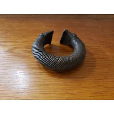 This is a Early 19th Century Yoruba Bronze Alloy Manilla Currency Bracelet From Nigeria.   It measures 3 1/8" x 2 3/4" x 1" high.   The piece is in excellent overall condition with minor signs of wear consistent with its age and use.  Please message us with any questions. Thanks. Yoruba Bracelet, Stone Fruit, 19th Century, Signs, Bracelet