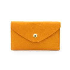 Turmeric OrangeTHE wallet. Functions like a dream, holds all you need, doubles as a clutch. Available in a myriad of colorful leather options, so you can choose the one that is perfectly you. This classic design features 6 credit card slots, a compartment for organizing bills and receipts, and a back zippered coin pocket— all in a slender silhouette. The sleeve of this wallet also holds your phone, so feel free to carry it solo anytime you feel like getting dressed up. Available in soft chrome t Clutch Wallet With Card Slots, Versatile Clutch Wallet With Card Slots, Everyday Clutch Wallet With Card Slots, Everyday Envelope Wallet With Rfid Blocking, Everyday Rfid Blocking Envelope Wallets, Everyday Trifold Clutch With Card Slots, Everyday Envelope Card Holder, Gold Bifold Clutch With Card Slots, Everyday Envelope Wallet With Card Slots