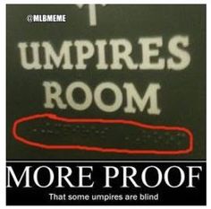 a sign that says umpires room with an arrow pointing to the right and there is no image on it