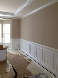 an empty room with white trim and molding on the walls is shown in this instagram post