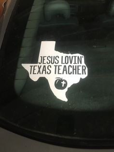 a sticker that says jesus lovin'texas teacher on the side of a car