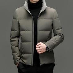 Elevate Your Winter Wardrobe With The Wenig Men's Fashionable Thickened Down Jacket, A Blend Of Style And Functionality Tailored For The Modern Man. This Jacket Is Generously Filled With High-Quality White Duck Down, Featuring An Impressive Fill Power Of 86% To 90%, Ensuring Superb Insulation And Warmth. Crafted Without A Hood For A Sleeker, More Business-Casual Aesthetic, The Main Fabric And Lining Of The Jacket Are Made From Premium Polyester Fibers. This Choice Of Material Contributes To The Classic Slim Fit Winter Outerwear, Winter Business Outerwear Slim Fit, Slim Fit Business Outerwear For Winter, Winter Business Sport Coat In Slim Fit, Winter Business Slim Fit Sport Coat, Winter Slim Fit Long Sleeve Outerwear, Slim Fit Long Sleeve Winter Outerwear, Half Zip Windbreaker, Triclimate Jacket