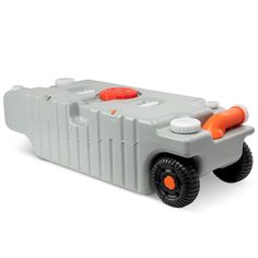 an orange and white toy truck with wheels on it's back end, sitting in front of a white background