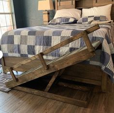 a bed that has been made and is sitting on the floor