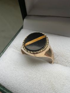 A rare vintage signet ring set with onyx and tiger's eye in a unique way. Has both casual and elegant vibes and can be used both when dressing up or down! Hallmarked and in good used condition. See photos for details. ・Size: US 7 1/4 ・Weight: approx 3g ・Width: top part approx .52 inch, band part approx .09 inch *Does not come with the jewelry box in the picture but comes with an original gift box. --------------------------------------------------------------------------------------------------------------------------------------------------- Please do not hesitate to ask any questions regarding the product before purchase and we will be happy to help! Since the pieces we sell are vintage, we believe that you as a customer should be well informed of the product condition. If you like our p Elegant Vibes, Tiger's Eye, Original Gift, Signet Ring, Ring Set, Ring Sets, Onyx, Jewelry Box, Jewelry Rings