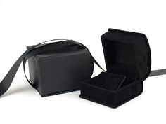 Luxurious velvet earring gift box. An earring box in a classic shape with elegantly curved lid and wrapped in sumptuous soft velvet inside and out. This box is available in midnight black and rich burgundy. Features: * Removeable velvet covered insert to safely and securely hold your earrings * Includes ribbon tied gift box * Make your gift even more special with this sumptuous earring box Size: Height 1.6 inches x Depth 2.2 inches x Width 2.2 inches H4cm x D5.5cm x W5.5cm EXPRESS SHIPPING AVAIL Black Jewelry With Gift Box For Gift, Black Jewelry With Gift Box For Giving, Black Jewelry With Gift Box, Black Jewelry With Gift Box For Occasions, Elegant Black Jewelry For Anniversary Gift, Elegant Black Jewelry For Gift, Formal Jewelry With Box Included For Gift, Formal Jewelry With Box For Gifting, Elegant Jewelry Box For Anniversary Gift