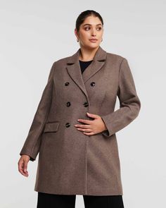 This gorgeous brown overcoat is the perfect way to stay warm and stylish! It is crafted from a luxurious wool-cashmere blend with velvet lapels and elegant flap pockets - what more could you want? Stay cozy this season in style! This plus size peacoat is perfect with a party dress and your favorite bootcut jeans, too Estelle Redford Coat | MOCHA | Jackets | Materials & Care Instructions: ['50% Polyester', 'Machine wash cold', 'Imported'] Brown Long Pea Coat For Cold Weather, Tailored Brown Double-breasted Outerwear, Double-breasted Brown Wool Coat For Work, Brown Wool Coat With Double-breasted Buttons For Winter, Winter Brown Wool Coat With Double-breasted Buttons, Brown Long Wool Coat With Double Button Closure, Brown Wool Coat With Double-breasted Buttons For Business, Brown Double-breasted Wool Coat For Business, Brown Double-breasted Long Pea Coat