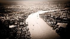 an aerial view of the river thames in london