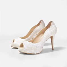 Walk down the aisle with our latest gorgeous Rosie V2 Ivory Lace Peep Toe Pumps. This pair of ivory satin platform pumps features lovely floral lace patterns at the side of the toe box all the way to the heel of the shoe in Version 2. The lovely bridal look is completed with matching pearl beads surrounding the floral pattern of the ivory lace. This comfortable wedding shoe is ideal for wedding receptions and special occasions. Dimensions: 4 inch with 0.5 inch platform. Materials: Satin, lace an Wedding Shoes White, Shoes Beaded, Glamourous Heels, Bridal Boots, Bohemian Sandals, Wedding Shoes Comfortable, Cocktail Dinner