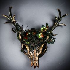 This Forest Animal Skull Mask With Deer Horns Is Made From Plastic, And Hand Crafted With Different Element Then Painted For An Beautiful Unique Mythological Forest Look. The Mask Is About 14" Tall And 14" Wide. The Masquerade Mask Will Make A Great Costume Accessory. This Masquerade Can Also Be A Create Home Wall Decor After The Party. Product Feature Made From Plastic And And Hand Crafted With Different Element Then Painted. Great For A Masquerade Ball, Venetian Costume, Halloween Costume, Mus Deer Mask Masquerade, Deer Masquerade Mask, Green Man Mask, Meadowlark Oc, Forest Creature Costume, Dnd Masquerade, Masquerade Outfit Men, Male Masquerade Mask, Masquerade Mask Ideas