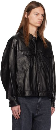 Grained lambskin leather jacket. · Spread collar · Button closure · Flap and welt pockets · Cropped hem · Dropped shoulders · Single-button barrel cuffs · Adjustable button tabs at back hem · Welt pockets at interior · Logo-woven nylon satin lining · Logo-engraved gunmetal hardware Supplier color: Black Luxury Leather Jacket With Button Closure And Collared Shape, Luxury Collared Leather Jacket With Button Closure, Classic Leather Jacket With Flap Pockets, Black Leather Outerwear With Button Cuffs, Classic Long Sleeve Biker Jacket With Button Closure, Classic Long Sleeve Biker Jacket, Classic Spring Biker Jacket With Button Closure, Classic Biker Jacket With Button Closure For Work, Classic Biker Jacket For Workwear