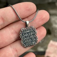 Silver Surah Al-Kawthar Necklace, Arabic Text Necklace , Quran Pendant Necklace Silver Arabic Text Necklace, 925k Sterling Silver Necklace ★Item Details * Gender : Male / Female * Material : 925K Sterling Silver ✔ Ready to Ship in 1-2 Business Days .. ✔ Shipped to the Worldwide 1-5 business days with free shipping... ✔ The product will be sent to you with a handmade wooden box to avoid any damage during shipping... ✔ Visit our store, browse other Men's jewelry, silver and gold collections, and find the perfect piece you're looking for... Click For Our Other Products https://www.etsy.com/shop/MercansilverTR?ref=simple-shop-header-name&listing_id=1003010735 Handmade Wooden Boxes, Pendant Necklace Silver, Gold Collection, Jewelry Silver, Men's Jewelry, Silver And Gold, Sterling Silver Necklace, Wooden Box, Necklace Silver