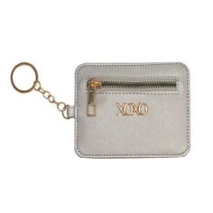 Stay organized with this Xoxo Key Chain Card Case. How do you accessorize? Check out our ACCESSORIES GUIDE for essential tips to elevate your style with must-have accessories.DETAILS 4.5"L x 3.5"H x 0.25"D Zipper closure Gold-tone hardware Exterior: 1 zip pocket, 5 card slots and key ringCONSTRUCTION & CARE Exterior: faux leather Lining: polyester Spot clean Imported Size: One Size. Color: Metallic Silver. Gender: female. Age Group: adult. Cheap Everyday Card Holder With Key Clip, Card Holder Wallet Keychain, Black Card Holder With Key Chain For Everyday Use, Black Card Holder With Key Clip For Travel, Pink Wallets With Card Slots For Valentine's Day, Card Case, Staying Organized, Card Slots, Handbag Accessories