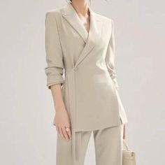 Elevate Your Office Wardrobe with Elegance and Style Introducing the perfect blend of modern chic and vintage elegance - our Vintage Office Lady Suit. This two-piece set features a sophisticated long sleeve blazer paired with high-waist straight pants, creating a polished and professional look ideal for the contemporary woman. Whether you're leading meetings or attending business luncheons, this ensemble ensures you make a statement while embodying confidence and style. Product Features Flattering Fit: Tailored for a slim, flattering fit that accentuates your figure. Versatile Style: Timeless solid pattern, perfect for all-season wear. Comfort and Quality: Made from high-quality polyester broadcloth, offering durability and comfort. Practical Design: Equipped with convenient pockets and a Tailored Suits Women, Elegant Suits For Women, Tailored Suit Women, Power Suits For Women, Suit Set Women, Professional Dress For Women, Lady Suit, Blazer For Women, Office Wardrobe