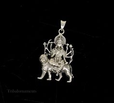 Divine 92.5 sterling silver Indian Hindu Idols Blessing Goddess Bhawani/Durga/Santoshi maa with lion vintage antique style stunning divine pendant, best gifting unisex jewelry from India. Metal-925 sterling silver. Item type-Pendant/ Locket Weight-17.910 grams. Height-5.9 centimeter. Width-3.5 centimeters. Stamped-925. Finish-Oxidized. note :chain is not include in this price, to purchase chain please visit following links: https://www.etsy.com/listing/823425858/16-to-30-long-screw-chain-925-ste Sterling Silver Jewelry For Puja And Festivals, Traditional Locket Jewelry For Navratri, Hallmarked Jewelry For Puja And Navratri, Sterling Silver Jewelry For Diwali Puja, Spiritual Hallmarked Jewelry For Puja, Locket Jewelry For Diwali Rituals, Ceremonial Locket Jewelry For Diwali, Diwali Rituals Locket Jewelry, Spiritual Sterling Silver Jewelry For Navratri