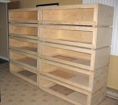 a large wooden shelf sitting in the middle of a room