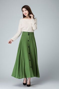 "This chic light green maxi skirt created with a soft linen, design with a fit and flare silhouette for a feminine feel , completed with a fitted waist for a defined figure. DETAIL * Soft linen * 50% linen , 50 cotton * No lining * Seam pocket * Right side zipper closure * Ankle Length * A Line skirt, button front skirt * Wash by hand or machine with cold water * Perfect spring, summer, autumn SIZE GUIDE Size vary between Brand and Country Please get your body measurement with our Size Guide And Green A-line Maxi Skirt For Spring, Chic Green A-line Maxi Skirt, Green Fitted A-line Maxi Skirt, Buttoned Full Maxi Skirt, Spring Solid Color Maxi Skirt With Wide Hem, Spring Buttoned Maxi Skirt, Buttoned Maxi Skirt For Spring, Green Buttoned Skirt For Summer, Elegant Green Wide Leg Maxi Skirt