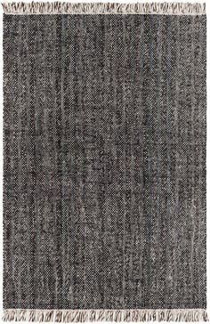 a black and white rug with fringes