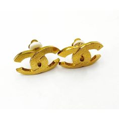 This is part of Chairish’s Costume Jewelry assortment.  Chanel Gold Plated Gold Matte Texture Clip on Earrings  *Marked 29 & 2914 *Comes with the original box and tag  -Approximately 1" x 0.75" -This is one of the most coveted and best selling classic Chanel earrings. -Very shiny and clean -In an excellent vintage condition Designer Tarnish Resistant Gold Earrings, Luxury Clip-on Earrings For Gift, Designer Gold-plated Earrings, Designer Gold Tarnish Resistant Earrings, Designer Gold Earrings For Evening, Luxury Formal Plug Earrings, Formal Luxury Gold Plug Earrings, Luxury Gold Plug Earrings For Formal Occasions, Designer Jewelry Set With Earrings