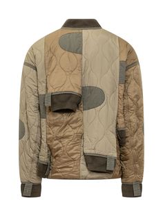 Green down quilted jacket. Long sleeves. Front zipper closure. Ribbed knit collar and cuffs. Two pockets. Front and back sleeve details.Composition: Outside:, 100% Nylon Lining:, 100% Cotton Padding:, 100% Polyester | Mihara Yasuhiro Men's Down Quilted Jacket in Khaki | FW22/23 Green Quilted Jacket, Man Down, Jacket Long, Top Designer Brands, Oversized Silhouette, Engineered Garments, High End Fashion, Knit Collar, Sleeve Detail