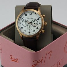 New! Men's Fossil Chronograph Rose Gold Brown Leather Watch - Band New With Tags! - Limited Quanity -100% Authentic - Full Retail Package With All Accesories "Let Your Wardrobe Reflect Your Happiness!" :) - M About The Watch: Case Size: 43mm Case Color: Rose Gold Strap Width: 22mm Leather Chronograph Watch With Analog Display As Gift, Rose Gold Leather Watch With Subdials, Classic Rose Gold Analog Chronograph Watch, Classic Rose Gold Chronograph Watch, Leather Watch With Metal Dial As Gift, Leather Watches With Metal Dial As Gift, Leather Chronograph Watch As Gift, Classic Leather Chronograph Watch As Gift, Leather Analog Watch As A Gift