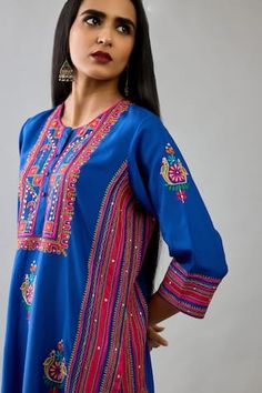 Blue silk straight kurta with muti-colored floral, thread and sequins embroidery. Comes with fuchsia straight pant and a light silk dupatta. - Aza Fashions Traditional Mirror Work Kurta For Spring, Traditional Dupatta With Mirror Work For Spring, Blue Cotton Traditional Wear With Mirror Work, Blue Cotton Kurta With Mirror Work, Designer Blue Salwar Kameez For Spring, Designer Spring Blue Salwar Kameez, Traditional Blue Kurta With Floral Embroidery, Blue Dupatta With Dabka Work For Spring, Blue Bollywood Kurta For Spring