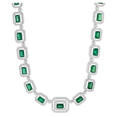 Designer: custom Material: 14K white gold Diamond: 801 round brilliant cut = 7.23cttw Color: G Clarity: VS-SI1 Emerald: 31 = 18.14cttw AAA+ Dimensions: necklace measures 16-inches in length Weight: 37.00 grams Luxury White Gold Emerald Diamond Necklace, Luxury Emerald Diamond Necklace, Formal White Gold Tennis Necklace With Gemstone, Luxury Diamond Cut Emerald Necklace For Anniversary, Luxury Platinum Necklace With Pave Setting, Luxury Emerald Necklace For Anniversary, Classic Diamond-cut Emerald Necklace, Classic Diamond Cut Emerald Necklace, Luxury Platinum Diamond Necklace With 17 Jewels