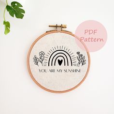 a cross stitch pattern with the words you are my sunshine and a heart on it