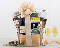 a champagne gift basket with two flutes