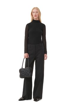 These Striped High-waisted Wide Pants are made from a blend of recycled polyester. The trousers are designed in a regular fit and feature a hook and bar closure, belt loops, side pockets and a back pocket. Fitted Wide Leg Pants With Hip Pockets For Workwear, Modern Fitted Pants With Zipper Closure, Modern Workwear Bottoms With Zipper Closure, Black Zipper Closure Bottoms For Work, Workwear Bottoms With Hidden Pockets For Fall, Chic Business Casual Pants With Hip Pockets, Chic Fitted Dress Pants With Side Pockets, Workwear Straight Pants With Hidden Pockets, Straight Pants With Hidden Pockets For Work