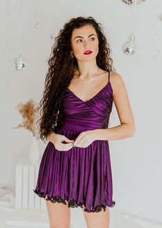 Flirty Sleeveless Jumpsuits And Rompers For Evening, Flirty Sleeveless Jumpsuits For Evening, Flirty Sleeveless Evening Jumpsuits And Rompers, Purple Camisole Tank Top For Party, Sleeveless Stretch Jumpsuits And Rompers, Flirty Style, Purple Spaghetti Straps Tank Top For Party, Purple V-neck Tank Top For Party, Flirty Sleeveless Jumpsuit For Party, Purple Sleeveless Jumpsuits And Rompers For Night Out