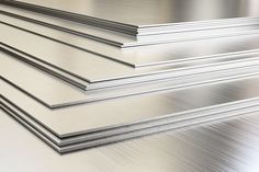 several metal sheets stacked on top of each other