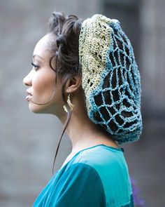 a woman wearing a crocheted head cover