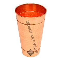 a copper colored cup with the words karat avl on it's side