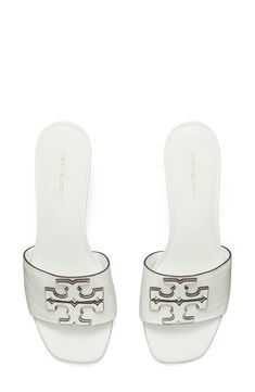 Dimensional logo detailing stands out atop the vamp of a laid-back slide sandal lifted by a cylindrical block heel. 2 1/4" heel (size 8.5) Leather upper, lining and sole Imported The Vamps, Slide Sandals, Block Heels, Tory Burch, Womens Sandals, Leather Upper, Nordstrom, Sandals, Heels