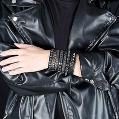 1. 3 Pcs Punk and Gothic Leather Bracelets you will get: A Cool Hollow Bracelet with Chain and Spikes + A Cool Hollow Bracelet with Chain and Rivet + An Attractive Punk Leather Bracelet with little Spikes 2. Punk and Gothic Style Bracelets: These bracelets are designed as punk and gothic jewelry accessories, therefore, you can not only match them with your daily casual dressing, but you can also dress them as punk and gothic outfits. 3. Adjustable Buckle: To continence our customers, these bracelets are designed with Adjustable buckle which mean you can save your time of confusing whether the bracelets' size fit your hands or not. 4. Material : Vintage Leather + Alloy 5. A good choice of present: These bracelets are made by man craft, it's suitable for sending to others as a gift. Black Rock Style Bracelets For Party, Punk Style Silver Wristband For Concerts, Edgy Metal Wristband For Party, Edgy Metal Wristband For Parties, Edgy Metal Bracelets For Concerts, Edgy Metal Bracelets For Concert, Alternative Style Metal Bracelets For Party, Alternative Metal Bracelets For Party, Rock Style Black Wristband For Parties