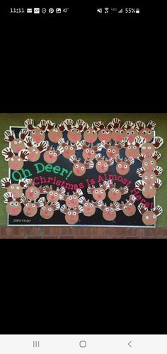 a christmas bulletin board with reindeers on it