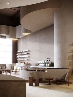 the interior of a modern restaurant with high ceilings