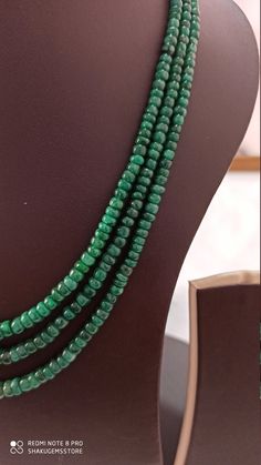 Emerald beryl Smooth Rondelle Beads Necklace 235 Carat Fine Quality Emerald Quartz Gemstone adjustable cord Necklace Stone : emerald beryl Shape :- fancy smooth oval Necklace - 18 inch 3 line string Size :- approx 2.5mm to 5mm Weight :- 235 carat Polish :- Handmade color - green makes a great gift for your loved ones. It is known as the 'love stone' as the message it emits is the strong vibration of unconditional love, joy, warmth and healing. As quartz crystals are profound amplifiers of energy Emerald Necklaces With Natural Stones In Round Beads Shape, Emerald Beaded Necklaces With Natural Stones, Emerald Necklaces With Polished Beads Gift, Green Single Strand Beads And Cabochons As A Gift, Emerald Rondelle Gemstone Beads Necklace, Rondelle Emerald Gemstone Beads Necklace, Emerald Rondelle Gemstone Bead Necklaces, Emerald Single Strand Necklaces With Round Beads, Single Strand Round Beaded Emerald Necklaces