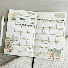 an open planner with stickers on it