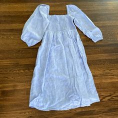 Reposhing This Item. Ended Up Going With A Different Dress For Family Photos, So It Was Never Worn Be Me! Excellent Condition! Casual Light Blue Smocked Dress, Light Blue Casual Midi Dress With Smocked Back, Blue Smocked Square Neck Dress For Daywear, Blue Long Sleeve Smocked Dress For Summer, Blue Long Sleeve Smocked Summer Dress, Casual Light Blue Smocked Dress With Ruched Detail, Casual Light Blue Midi Dress With Smocked Bodice, Light Blue Casual Midi Dress With Smocked Bodice, Blue Long Sleeve Smocked Dress For Daywear