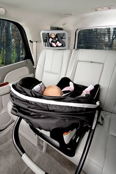 a car seat with a baby in it