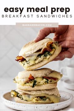 two sandwiches stacked on top of each other with text overlay reading easy meal prep breakfast sandwiches