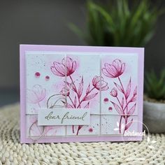 a close up of a card with flowers on it