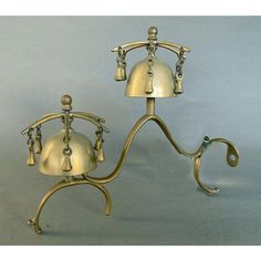 This was made from a 19th Century sleigh bell ensemble for use on a door, to announce the arrival of a guest.  The two bells give the most attractive, melodious ring when they are shaken by the opening of the door.  Or, fasten it to some post on your sleigh and go back in time…  Solid brass.  Measurements: about 12 ½ long, 4 inches wide, 9 ½ high. Go Back In Time, Sleigh Bell, The Arrival, Back In Time, The Two, The Door, In Time, Solid Brass, 19th Century