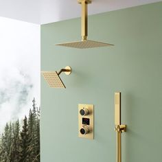 a shower head and hand held shower faucet with thermostaer in gold