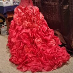 "Quinceanera or Sweet 16 formal evening gown. 2 piece skirt and corset top. Coral color, skirt is layers and layers of roses and ruffles. Skirt would circle low on top of hips, 30\" skirt waist. Top is vital beaded and beautiful. With corset back, it will fit a variable size. Dress is exquisive. A dress for a princess. Free shipping." Fitted Organza Quinceanera Dress, Organza Quinceanera Dress With Ruffles, Fitted Strapless Quinceanera Dress, Quinceanera Dress With Ruffles And Fitted Bodice For Prom, Ruffled Quinceanera Dress With Fitted Bodice For Prom, Fitted Floor-length Quinceanera Dress, Party Quinceanera Dress With Fitted Bodice In Organza, Organza Quinceanera Dress For Prom Season, Fitted Quinceanera Dress For Debutante Ball And Prom Season