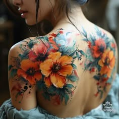 a woman with flowers painted on her back